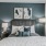 Furnished model apartment bedroom with large windows at The Oakley at Saraland