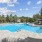 The Oakley at Saraland's community resort-inspired pool with ample lounge seating  on deck