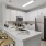 a kitchen with white cabinets