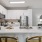 a kitchen with white cabinets